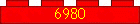 6980